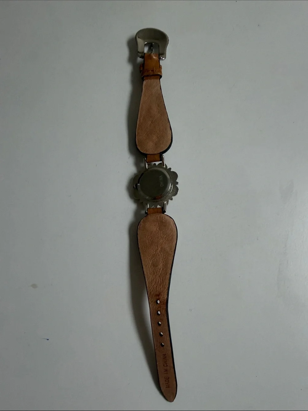 Source Unknown Brown Leather Wristwatch  Silver-Tone Floral Bezel needs battery